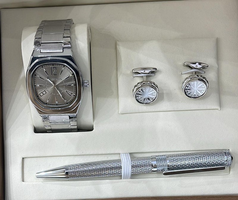 A gift set for men consisting of a wristwatch, a pair of cufflinks, and a ballpoint pen.